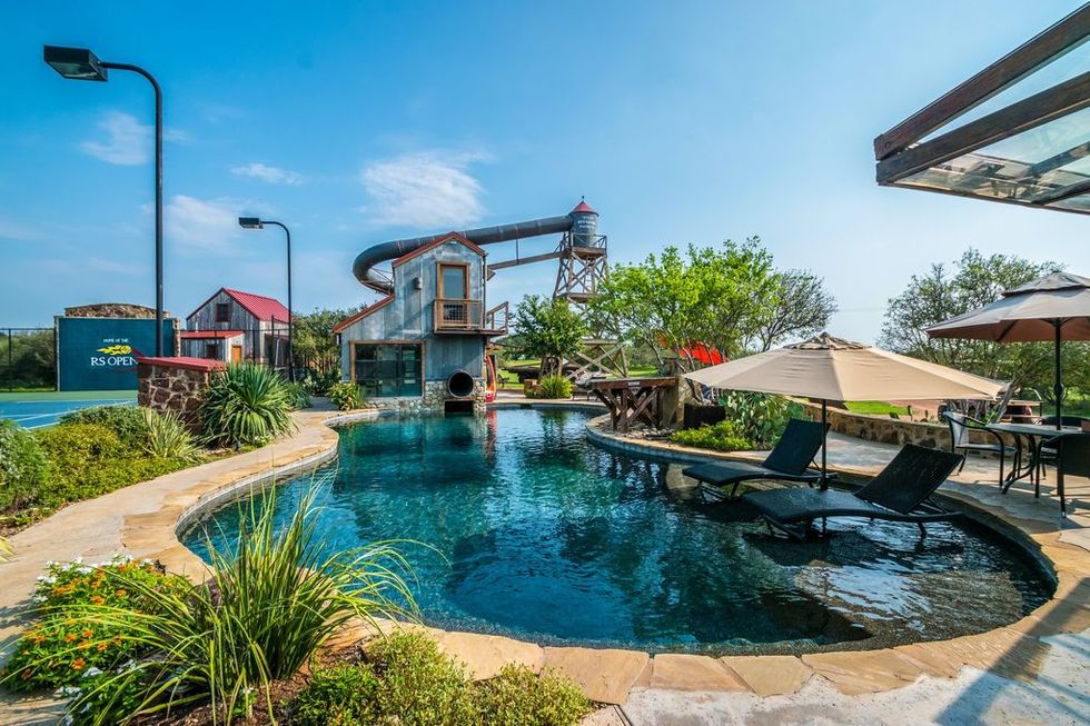 pool and waterslide at red sands ranch in texas
