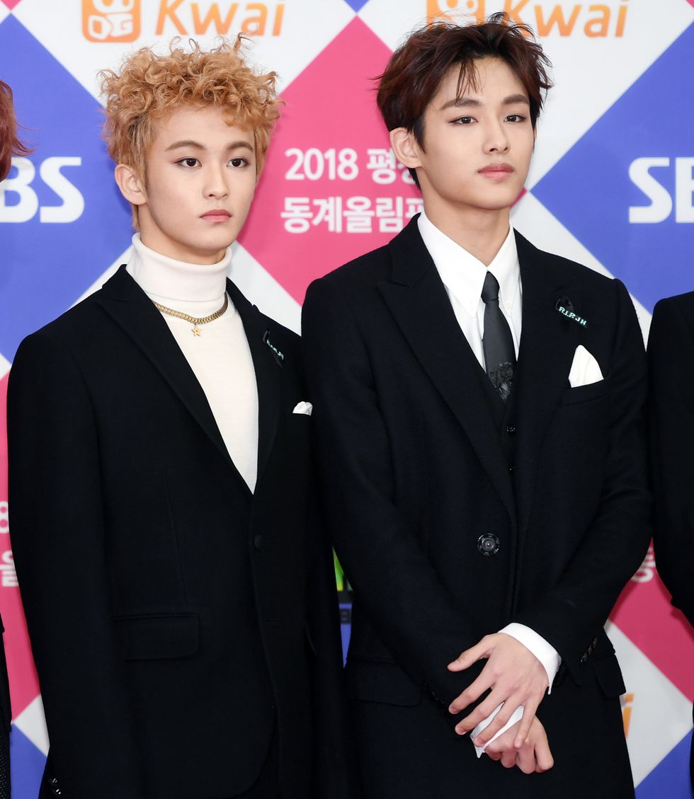 nct127mark winwin poses for pictures during photo wall event of '2017 sbs k pop awards' at gocheok skydome on december 25th in seoul, south korea photoosen