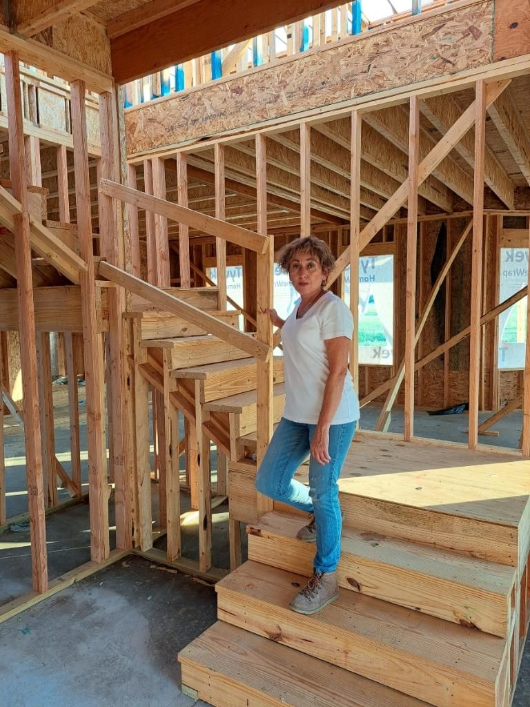 home builder ligia reyes on stairs