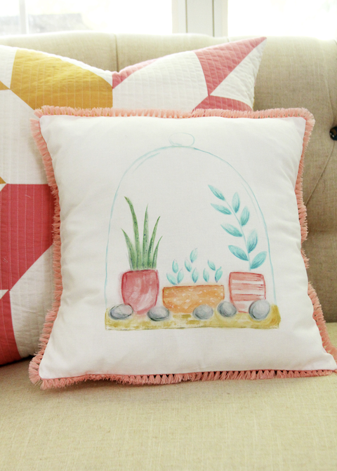 earth day crafts watercolor terrarium pillow on the couch