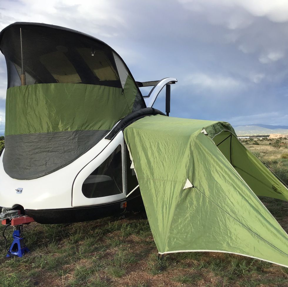 tent, camping, vehicle, grass, plant, experimental aircraft, shade,