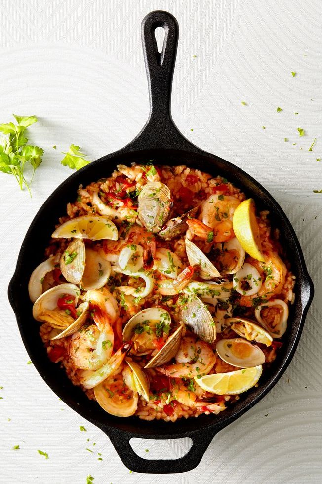 https://hips.hearstapps.com/hmg-prod/images/easiest-ever-paella-1611764963.jpg?crop=0.6666666666666667xw:1xh;center,top&resize=980:*