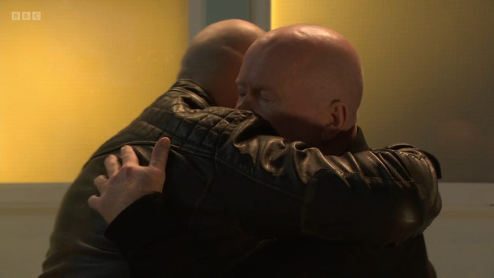 eastenders grant and phil, the mitchell brothers share a hug during a visit to the mental health hospital