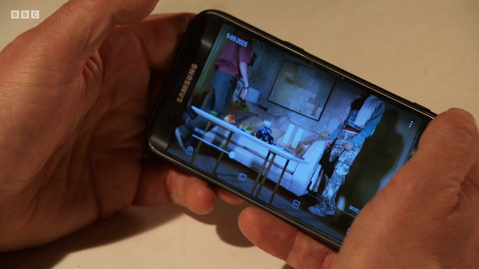 eastenders, joel and avani video playing on joel's mobile phone