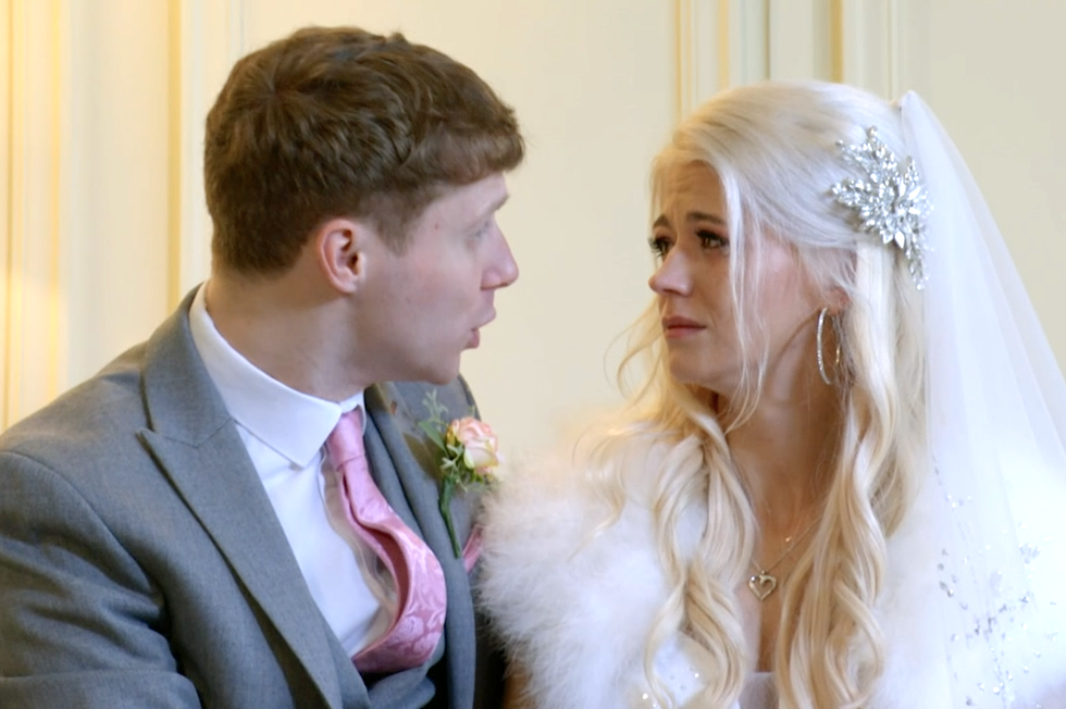 jay and lola in wedding outfits in eastenders