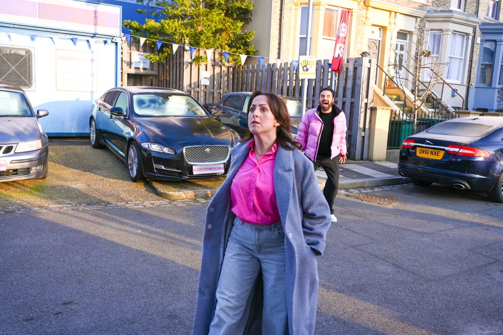 rylan clark with eastenders star natalie cassidy reenacting a scene in albert square