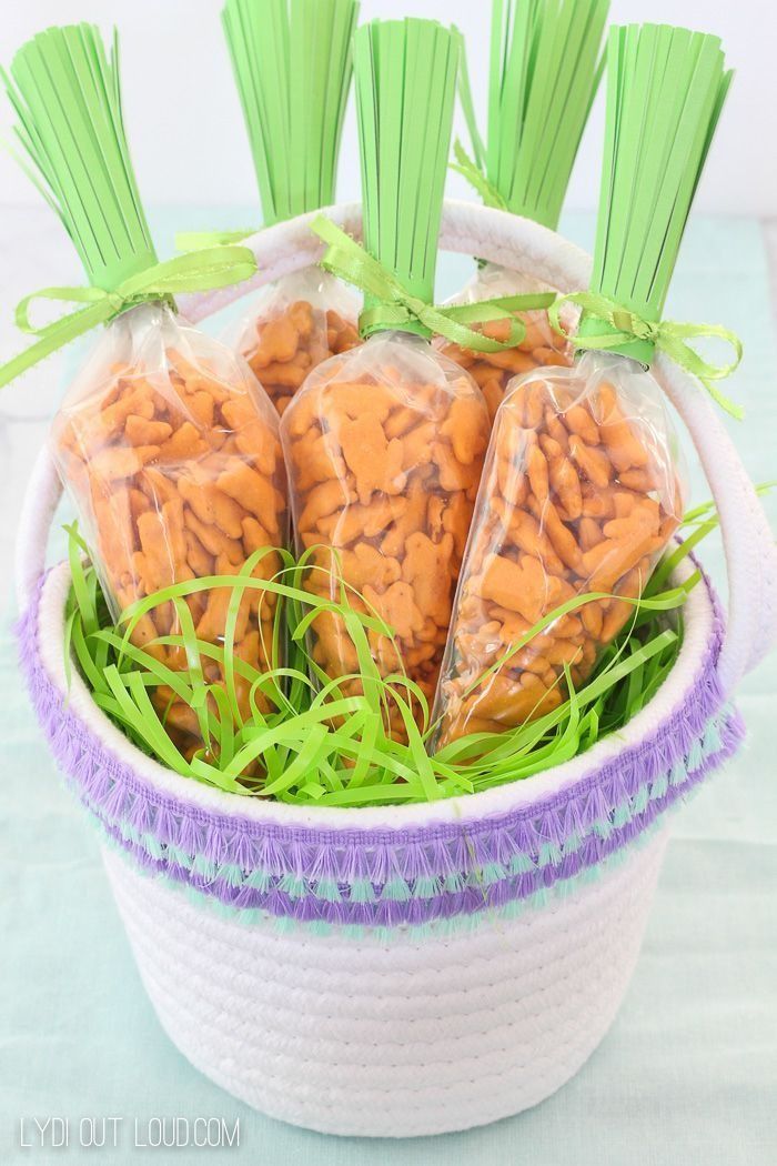 easter basket ideas blue and purple fringe basket with treats inside