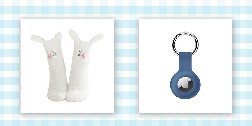 white fuzzy socks with bunny ears and fact at top and apple airtag encased in blue silicone holder