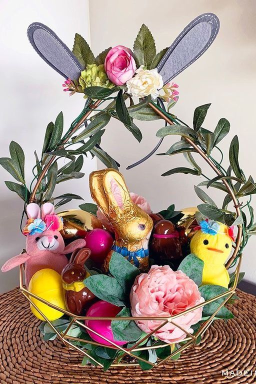 easter basket ideas woodland basket with faux vines, leaves and flowers on the handles