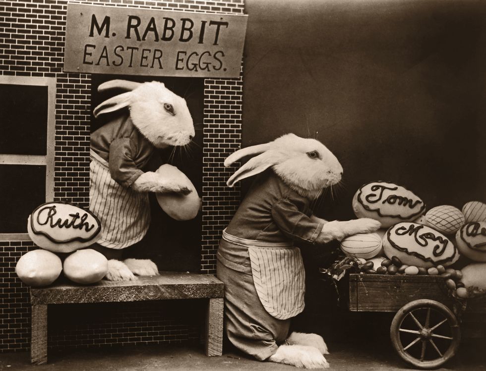 archival image easter bunnies loading eggs on cart