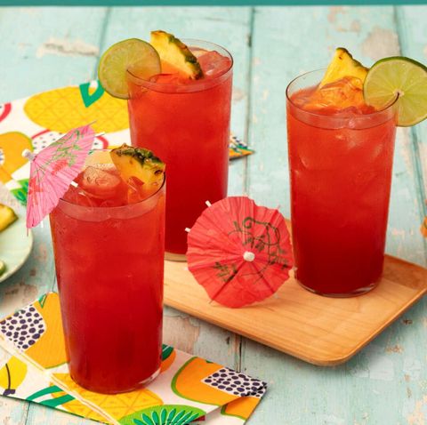 bay breeze cocktail with paper umbrellas and pineapple