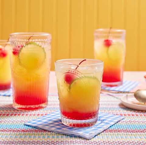 tequila sunrise with cherry in glass