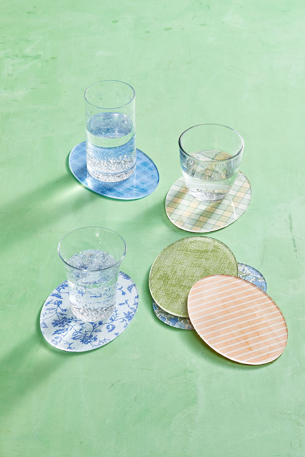 easter crafts, pastel colored egg coasters with glasses