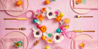 easter party table setting with egg carton centerpiece