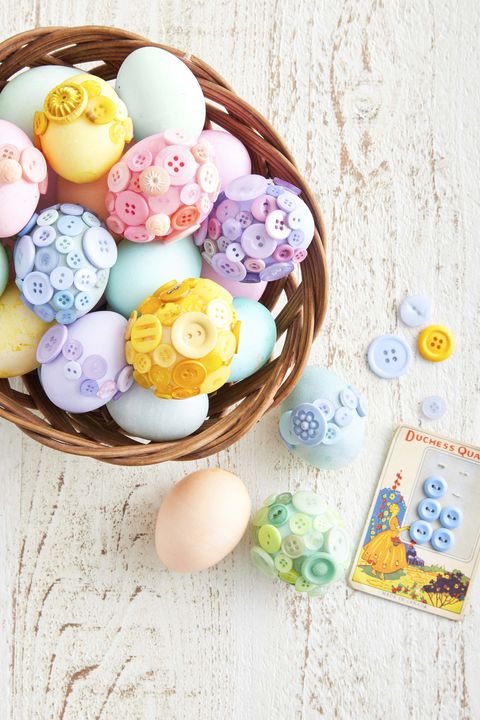 dyed easter eggs covered in colorful vintage buttons
