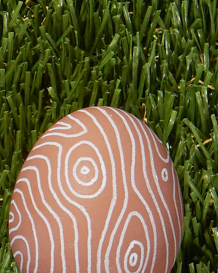 faux bois easter egg design created with a fine tip white paint pen