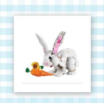 a basket of chalk eggs and a lego rabbit