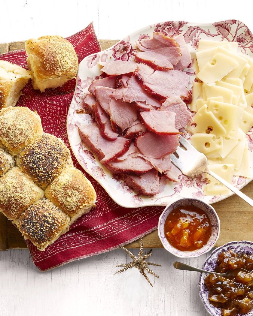 honey glazed ham and checkerboard rolls with cheese slices and jam