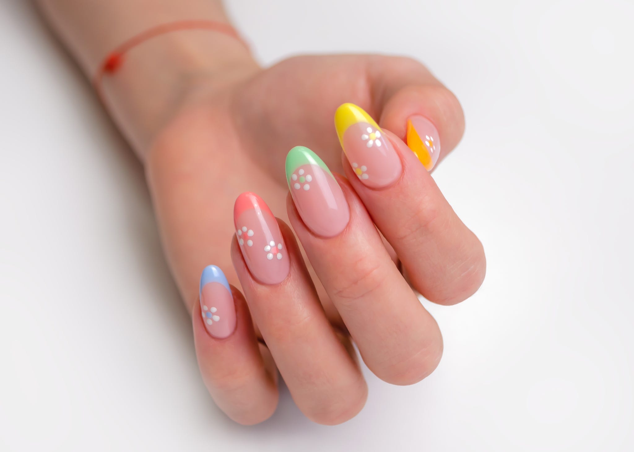 easter-nail-designs-flowers-65cd360a19434.jpg?crop=0.71435546875xw:1xh;center,topu0026resize=980:*