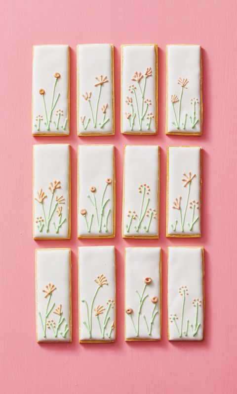 spring cookies with flowers on a pink background