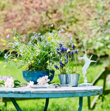 easter table display with flowers and bunny rabbit