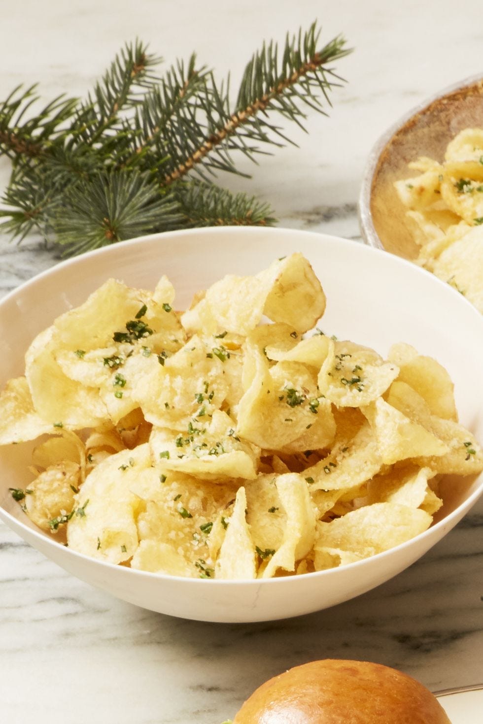 parmesan chive chips in a bowl