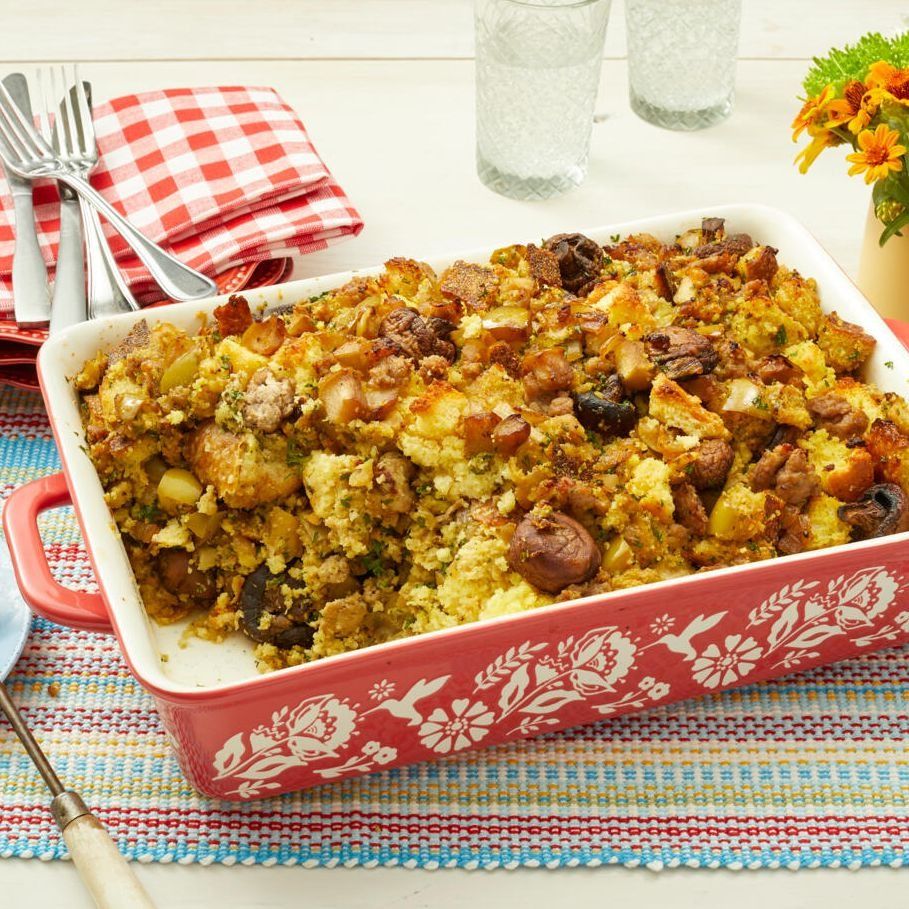 cornbread dressing with sausage and apples in red dish