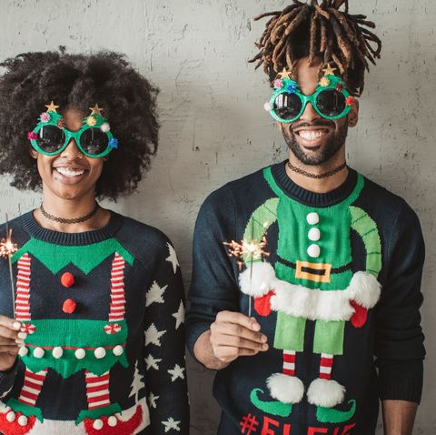 couple dressed in funny elf christmas sweaters, funny christmas tree sunglasses for easy couple costume