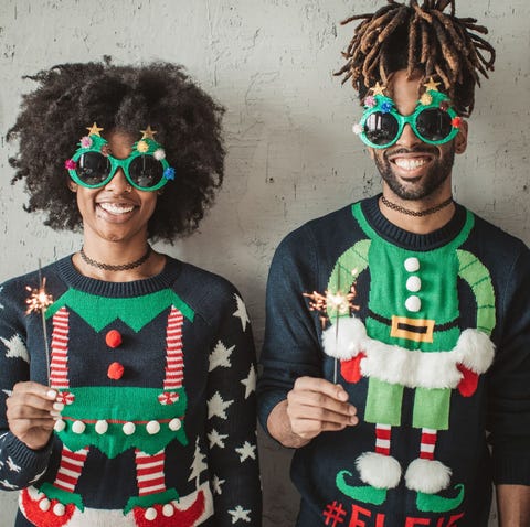 couple dressed in funny elf christmas sweaters, funny christmas tree sunglasses for easy couple costume