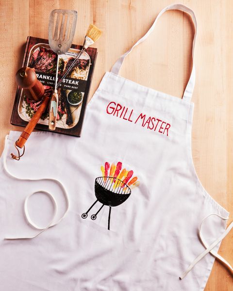 diy aprol with a grill and grill master painted on the front
