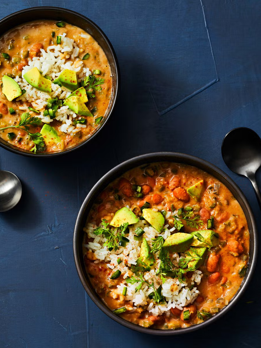 pinto bean and poblano soup with avocado on top