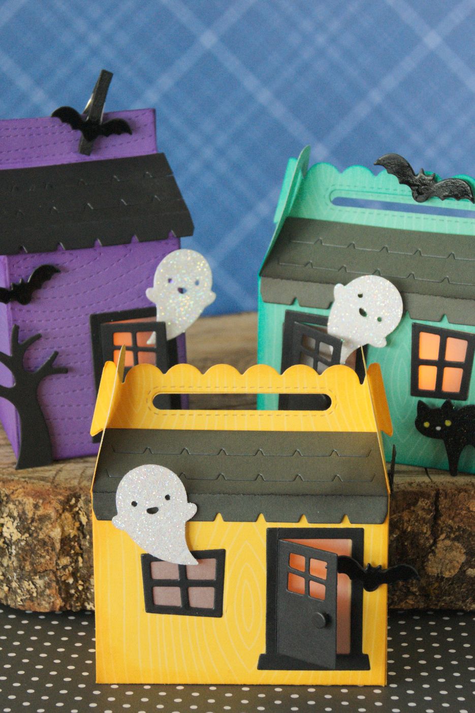 happy meal style treat boxes decorated like haunted houses with windows, doors, roof tiles, ghosts, black cat, tree, and bat