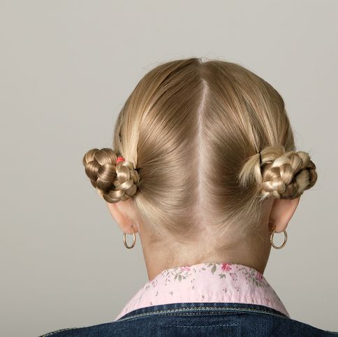 blonde girl with braids made into buns