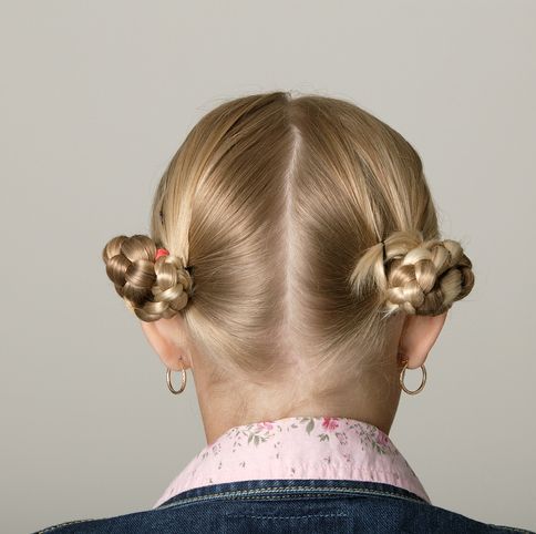 blonde girl with braids made into buns