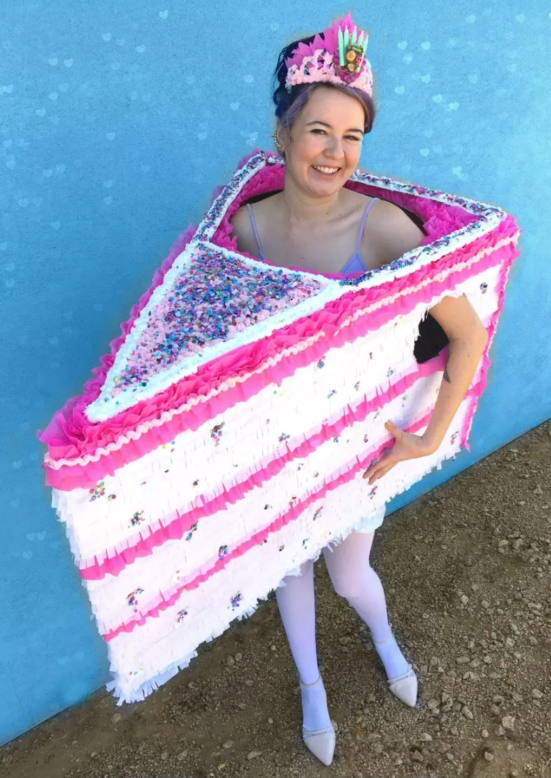 easy halloween costume, woman dressed in a large diy cake slice costume