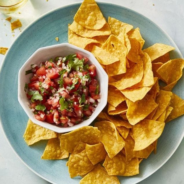 chips with red salsa on the side