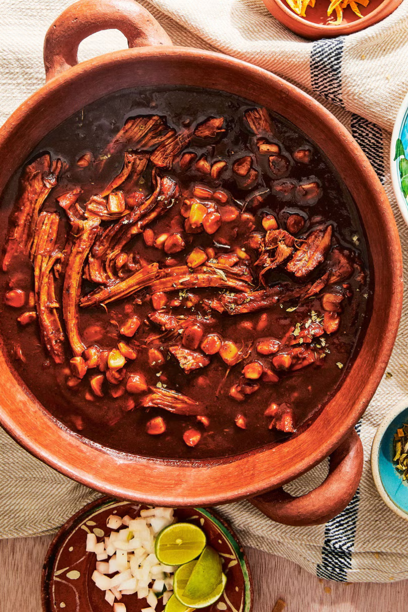 pozole rojo soup in a clay pot pozole rojo soup in a clay pot