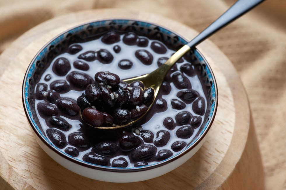 eating the black beans in sweet coconut milk soup