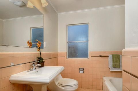 bathroom remodel ideas before pink wall tiles