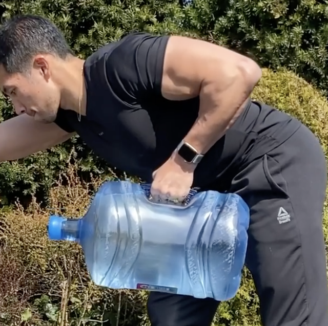 Exercise, black man and walking with water bottle, for training