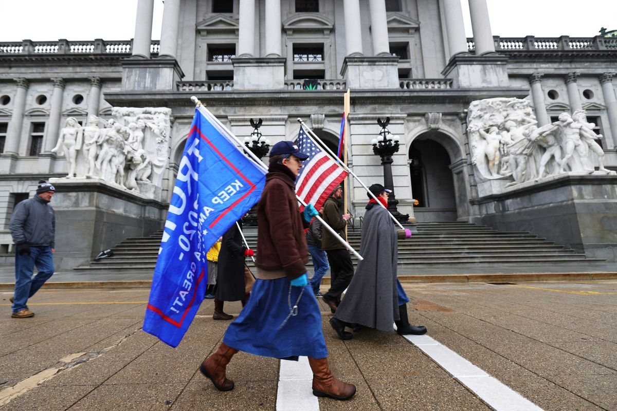 harrisburg, pennsylvania   december 14 supporters of president donald trump walk and pray around the pennsylvania state capitol on december 14, 2020 in harrisburg, pennsylvania electors in pennsylvania will meet today to certify the 2020 presidential election for president elect joe biden who won the electoral college 306 to 232 against incumbent president donald trump on friday, the supreme court tossed out a lawsuit filed by texas that intended to overturn biden's win in four battleground states that included pennsylvania  photo by michael m santiagogetty images