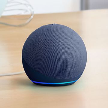 amazon echo dot 5th gen smart speaker shown on a kitchen worktop