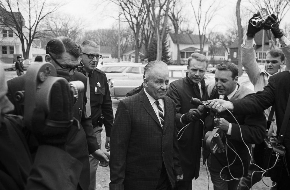 ed gein with police and reporters