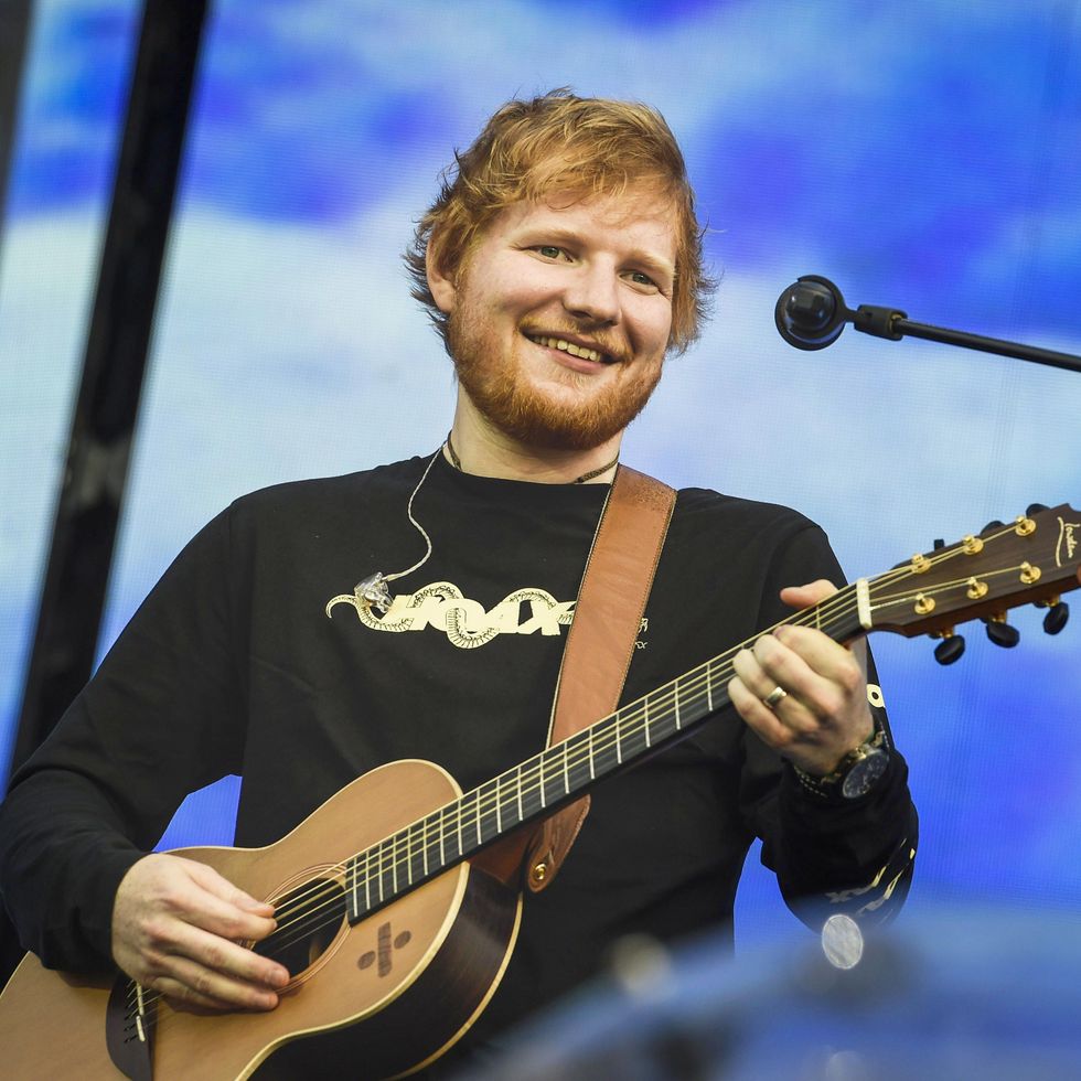 ed sheeran performing on stage in helsinki, finland, july 2019