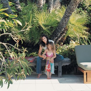 crawford and her daughter kaia by the pool