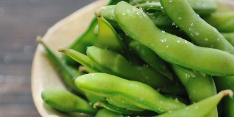 Bowl of edamame beans on bamboo mat bowl of edamame beans on bamboo mat