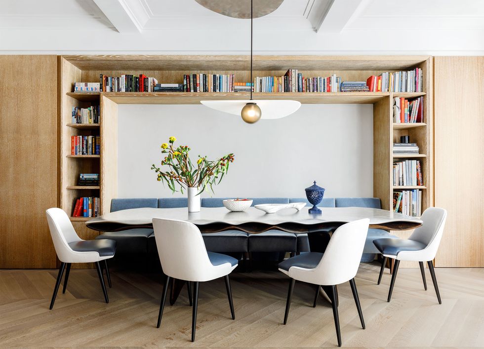 dining room with large bookcase