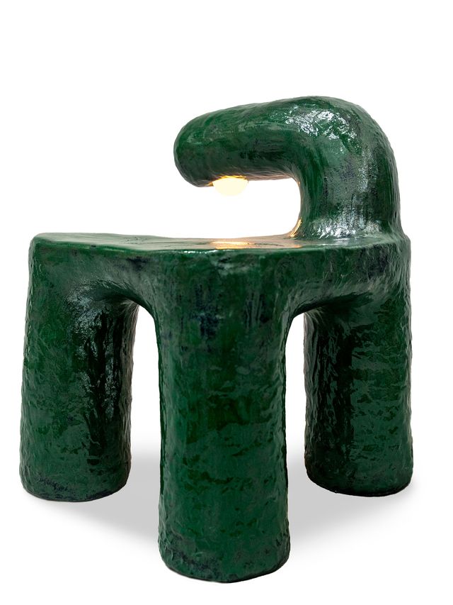 green painted tripod chair with overhanging light