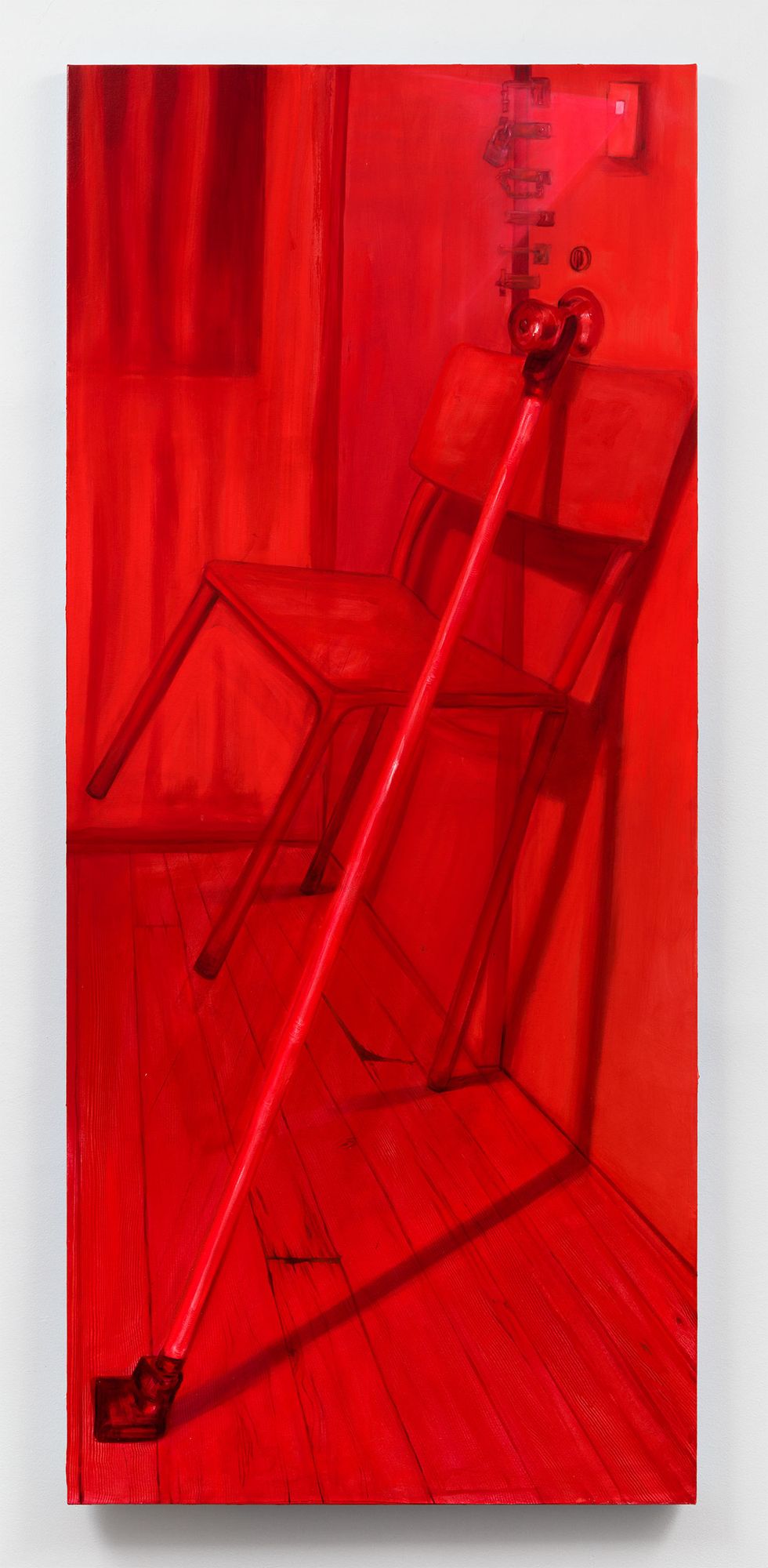 red painting of a chair leaning up against door and light shining through the peep hole
