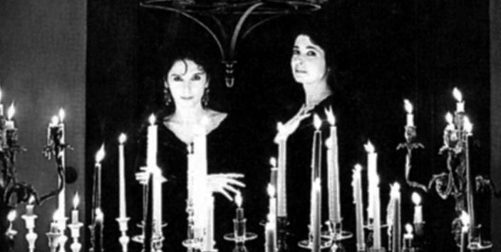 the sisters beauty is lit by the candles